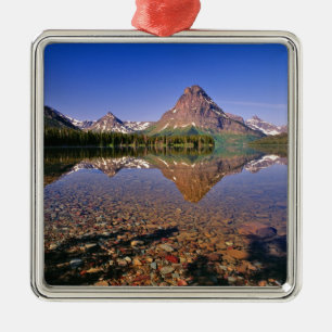Mountains reflect into calm Two Medicine Lake in Metal Ornament