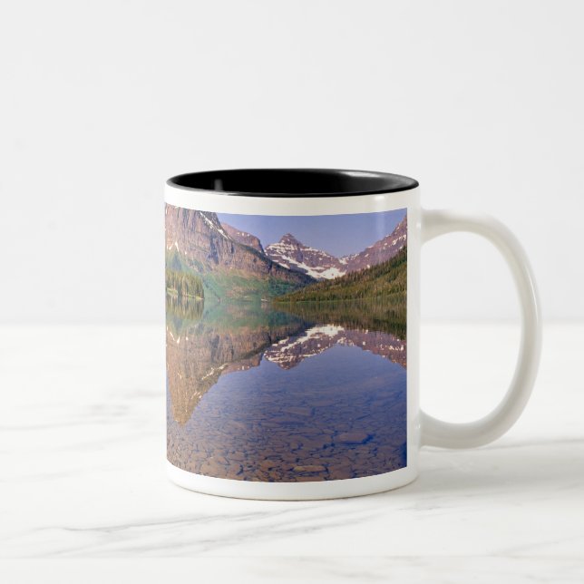 Mountains reflect into calm Two Medicine Lake in Two-Tone Coffee Mug (Right)