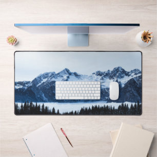 Mountains, spruce forest and clouds desk mat