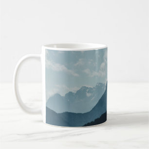 MOUNTAINS UNDER WHITE SKY COFFEE MUG