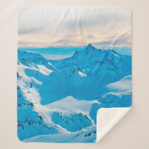Mountains with snow peaks and sunset skysnow,alpin sherpa blanket