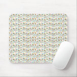 Mouse pad with a pattern of diverse smiley faces<br><div class="desc">Mouse pad with a pattern of diverse smiley faces in multiple colors,  creating a playful and cheerful atmosphere. Below,  a white mouse rests on it.</div>