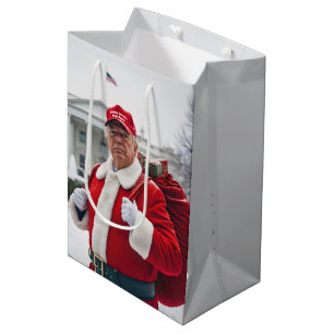 Moyen Santa Claus Trump avec le sac cadeau rouge