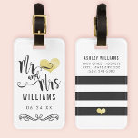 Mr. and Mrs. Monogram Black Gold Wedding Newlywed Luggage Tag<br><div class="desc">Stylish travel luggage bags for the new Mr. and Mrs. feature a stylish script design with heart and scroll accents,  bold black and white stripes,  and custom text on the front and back sides. Personalize with your married name and personal contact information.</div>