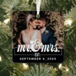 Mr And Mrs Wedding Gift First Christmas Married Metal Ornament<br><div class="desc">Elevate your first Christmas as a married couple with our "Mr. And Mrs. Wedding Gift First Christmas Married Metal Ornament." This exquisite ornament combines modern minimalism with a touch of sophistication, creating a perfect keepsake for the newlyweds. Crafted with meticulous attention to detail, this ornament features bold and stylish typography,...</div>