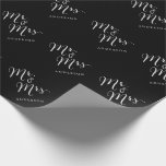 Mr & Mrs Classic Script Calligraphy Name Wedding Wrapping Paper<br><div class="desc">A modern classic and simple 'Mr. and Mrs.' white calligraphy script design with names that can be personalized, on a black background. The background colour can be changed to any colour of your choice. More font styles and editing features available within the product customisation page. This custom wrapping paper is...</div>