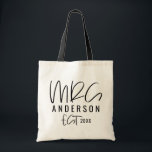 Mrs script typography wedding tote bag<br><div class="desc">Script text mrs typography wedding gift. Modern,  graphic design. Ideal for bachelorette party,  bridal shower parties,  wedding dat attire,  wedding gift or honeymoon.</div>