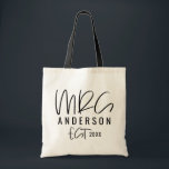 Mrs script typography wedding tote bag<br><div class="desc">Script text mrs typography wedding gift. Modern,  graphic design. Ideal for bachelorette party,  bridal shower parties,  wedding dat attire,  wedding gift or honeymoon.</div>