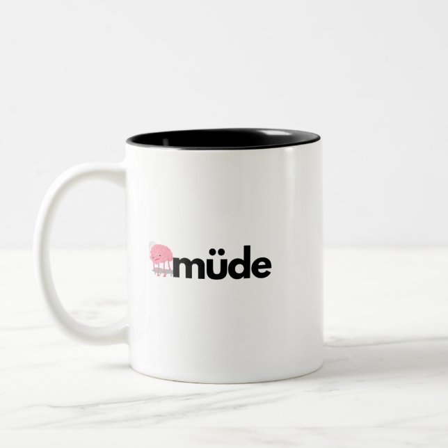 Müde – Minimalist German Word Funny Coffee Mug (Left)