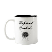 Mug à café bicolore 'Surpenseur professionnel' 