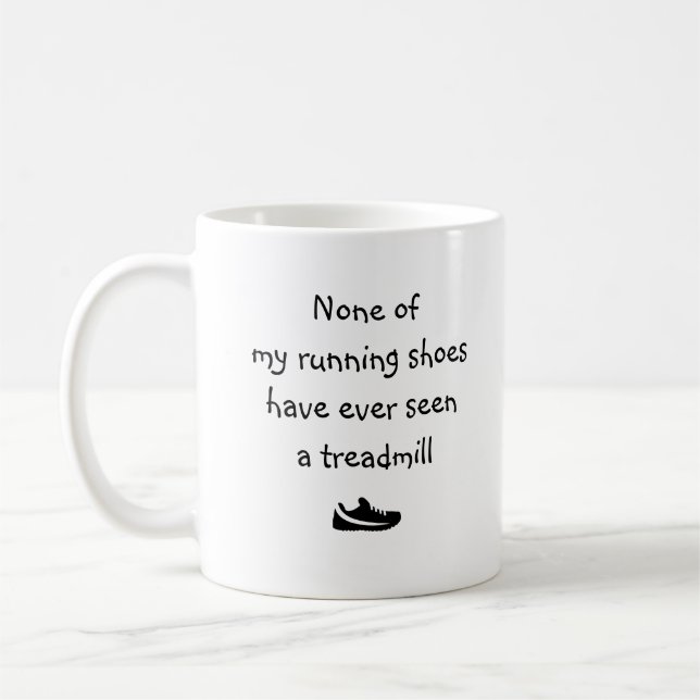 Mug Aucune de mes chaussures de course n'a jamais vu.. (Gauche)