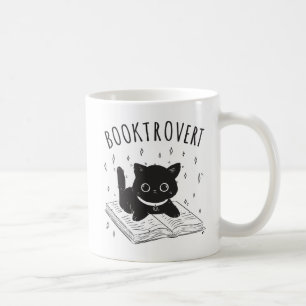 Mug Booktrovert chat avec livre et étoiles