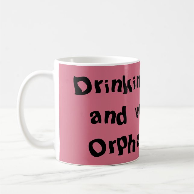 Mug café potable et police noire orpheline de (Gauche)