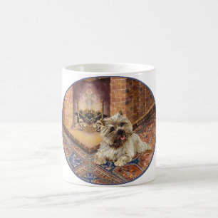 Mug Cairn Terrier près d'une cheminée confortable