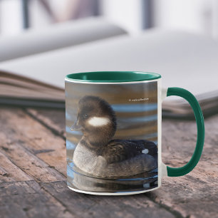Mug Canard à tête de tampon mou sur l'étang éclairé