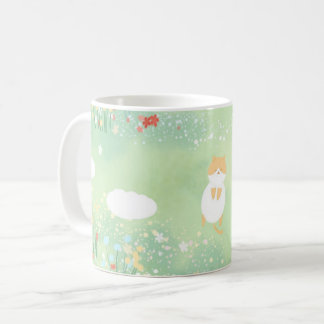 Mug chat dans l'herbe