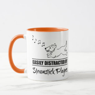 Mug Chien facilement distrait par les joueurs de strum