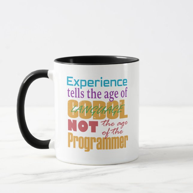 Mug Cobol Experience: Age of Code, Not the Programmer (Gauche)