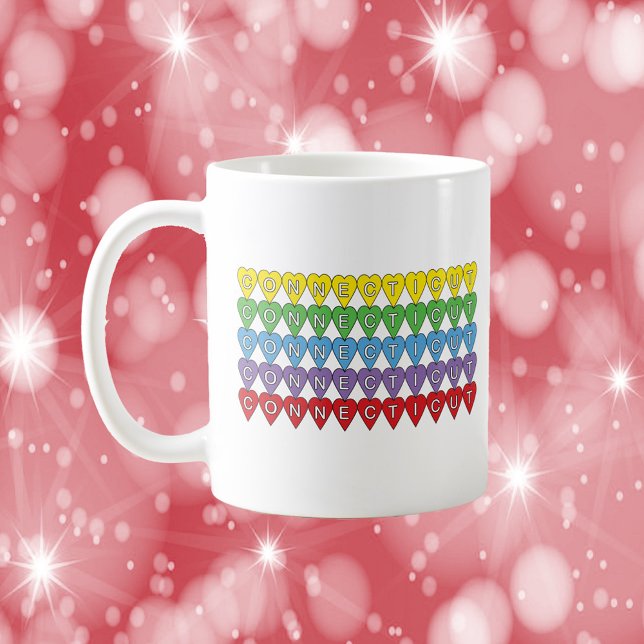 Mug Connecticut Rainbow Heart Motif (A mug that says Connecticut with yellow, green, blue, purple and red hearts)
