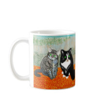 Deux chats partagent votre pause café