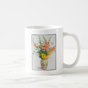 Mug Fleurs oranges et bleues dans un vase marocain