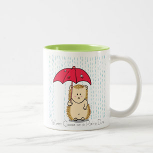 Mug hérisson mignon avec parapluie déchiré.