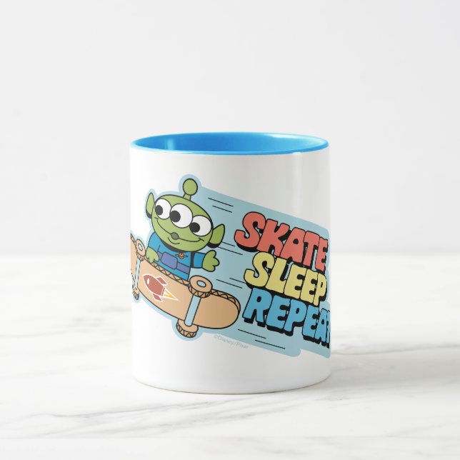 Mug Histoire du jouet | Petit Vert Hommes Patinage Dor (Centre)