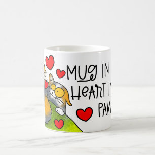 mug in hands heart in her paws