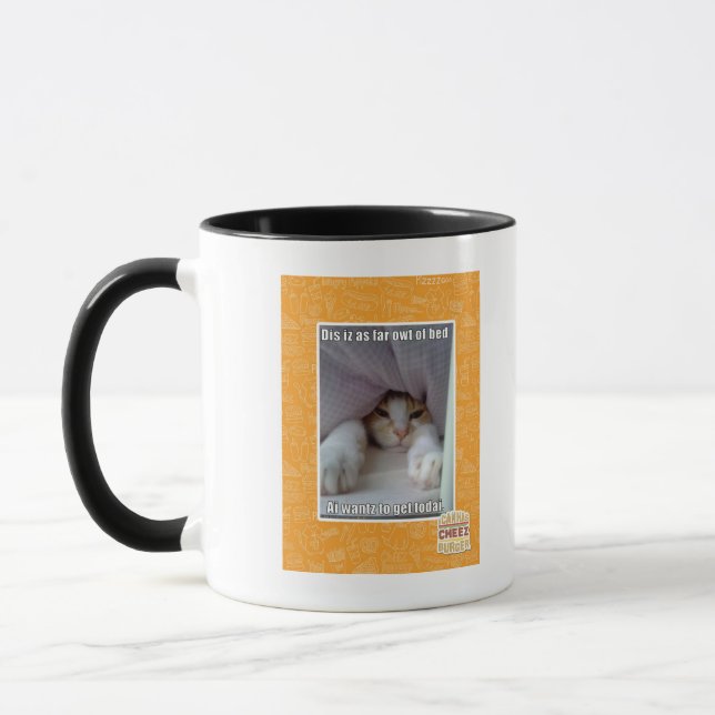 Mug Iz de DIS en tant que loin owt de lit. (Gauche)