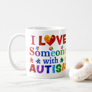 Mug J'aime quelqu'un avec AUTISM
