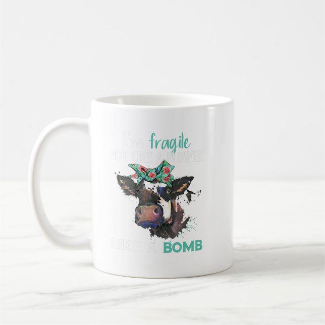 Mug Je suis Fragile, pas comme une fleur comme une Bom (Gauche)
