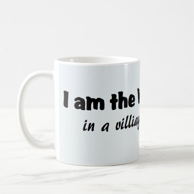 Mug Je Suis L'Idiot Du Village... (Gauche)
