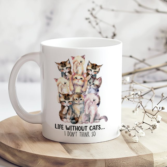 Mug "La vie sans chats... Je ne pense pas" Chats migno ("Life without cats...I Don't Think So" Cute Cats Coffee Mug on a boho wooden kitchen table.)