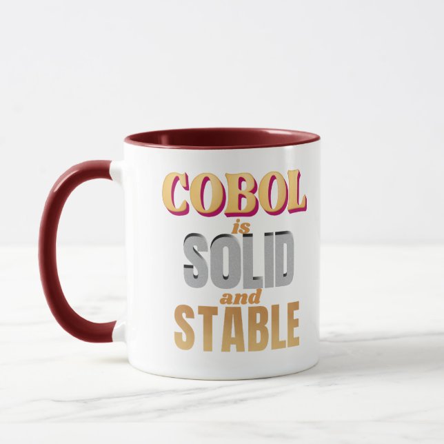 Mug Le langage de programmation Cobol est puissant et  (Gauche)