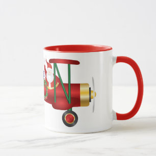 Mug Le père noël ondulant sur le biplan avec la tass