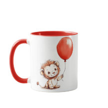 Lion bébé joueuse avec ballon rouge
