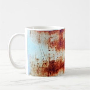 Mug métal rouillé, arrière - plan texturé.