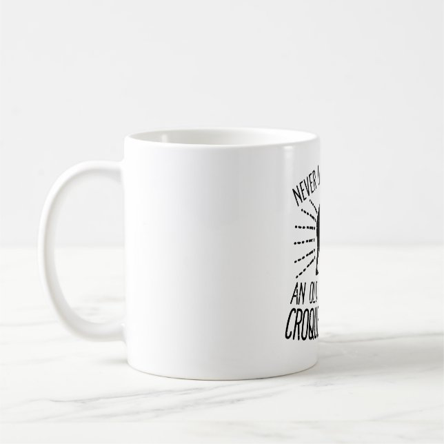 Mug Ne jamais sous-estimer le collier de croquet d'un  (Gauche)