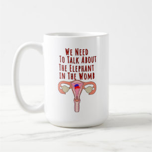Mug Nous devons parler de l'éléphant dans le ventre