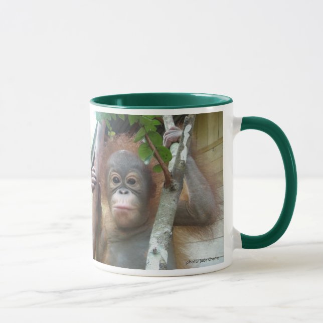 Mug Orphelin secouru par International de base (Droite)