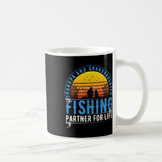 Mug Papi et petite-fille, compagnons de pêche pour la