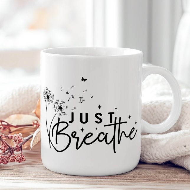 Mug "Respire seulement" Papillon Dandelion ("Just Breathe" Dandelion Butterfly Coffee Mug on a boho wooden table with pink flower.)