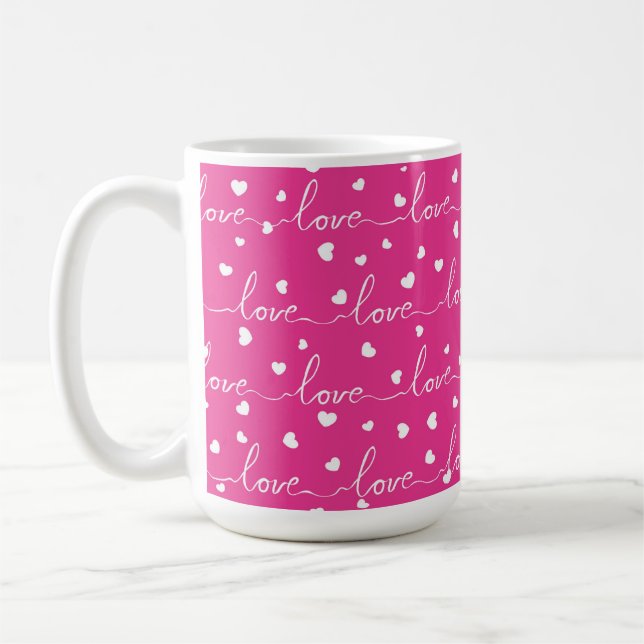 MUG ROSE BRILLANTE AVEC AMOUR BLANC SCRIPTÉ DE COEURS (Gauche)