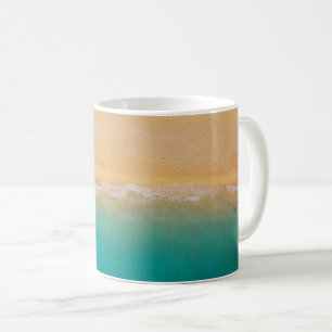 Mug Sable et rivage de la mer Photo