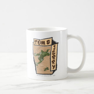Mug Tom et Jerry sur un canapé tan