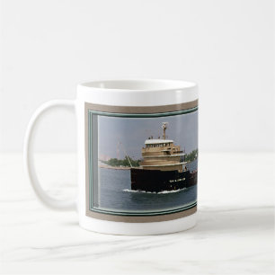 Mug Tom M. Girdler
