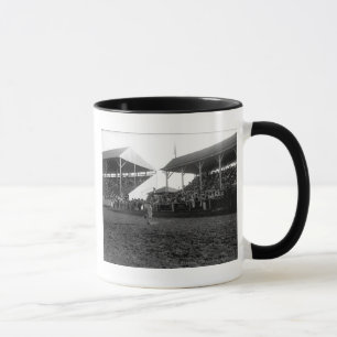 Mug Tours Roping à un rodéo