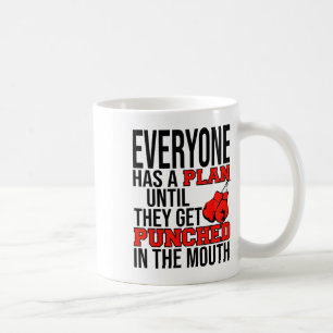 Mug Tout le monde a un plan jusqu'à ce qu'ils se prenn