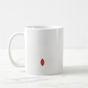 Mug un design rouge et marron sur un arrière - plan bl