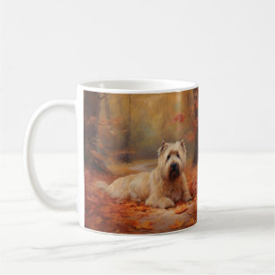 Mug Wheaten Terrier dans les feuilles d'automne automn